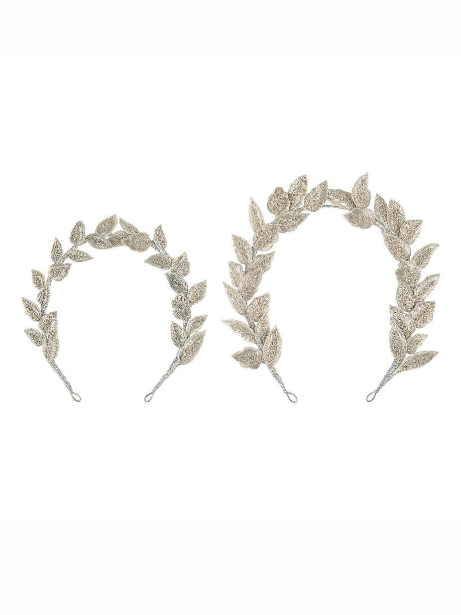 The Charlotte Crown, a handmade floral crown with embroidered leaves and flowers, flexible wire base for adjustable positioning. Available in full and mini sizes for children and adults.