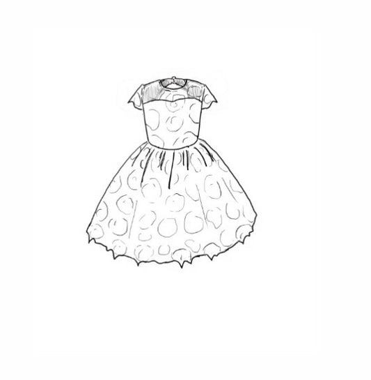 The Baby Annabelle – handcrafted cotton floral lace baby dress with a keyhole back and pearly button closure. Features a full twirl-worthy skirt, silky soft lining, and personalized embroidery. Perfect for first special occasions, weddings, communions, and celebrations