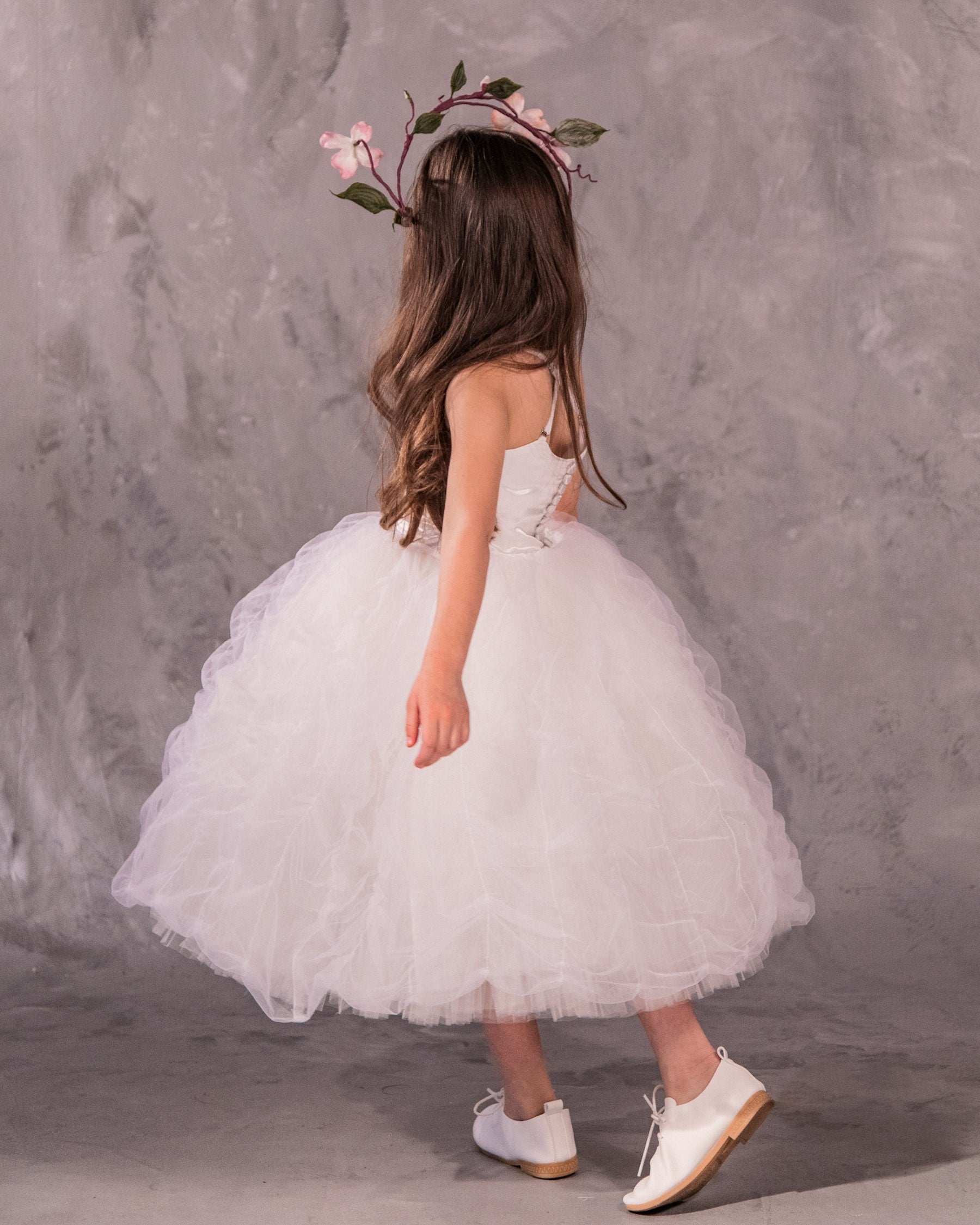 The Lauren flower girl dress with satin bodice, ethereal tulle and pleated English net skirt, grosgrain trim, and covered buttons - perfect for weddings