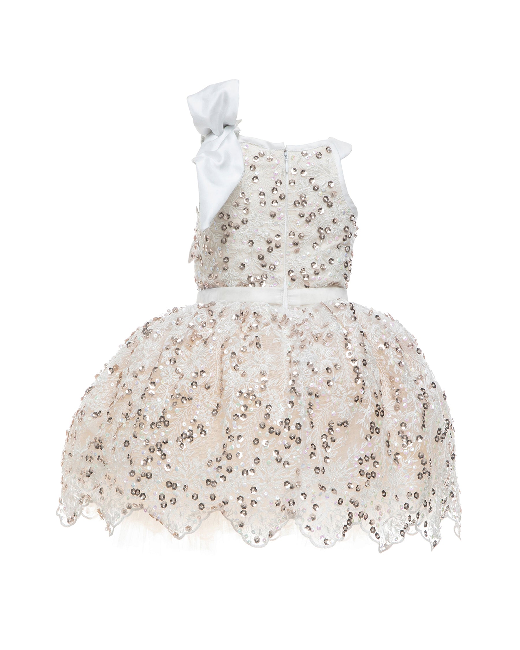 The Katy, a stunning party dress featuring hand-embroidered beading across the bodice and an extra-full skirt for maximum twirl. A velvet ribbon waist and a French-wired silk and brocade shoulder bow add a touch of elegance. Fully lined in silky soft fabric for comfort. Handcrafted in Brooklyn from beaded net, satin, tulle, and silk, with optional personalized embroidery. Perfect for weddings, parties, and special occasions.