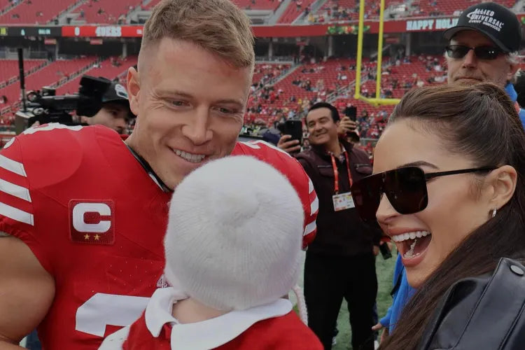 People- Olivia Culpo’s Baby Daughter Wears Knit Version of Christian McCaffrey’s Jersey.