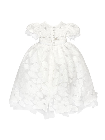 Doloris Petunia’s Baby Lace Ceremony Gown: hand‑cut floral cotton lace, point d’esprit edging, grosgrain bow at empire waist, button‑back closure, available in various skirt lengths, and paired with matching lace baby bonnet. Perfect for baptisms, christenings, and baby weddings.