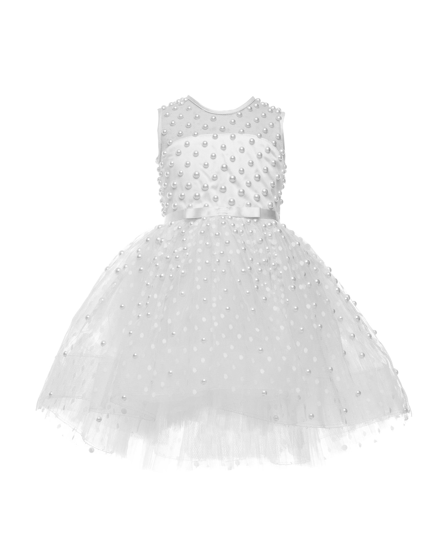 The Pearl flower girl dress featuring intricate pearl embellishments on an illusion neckline and bodice. Swiss dot tulle skirt with a twirly high-low hem, finished with a satin bow. 