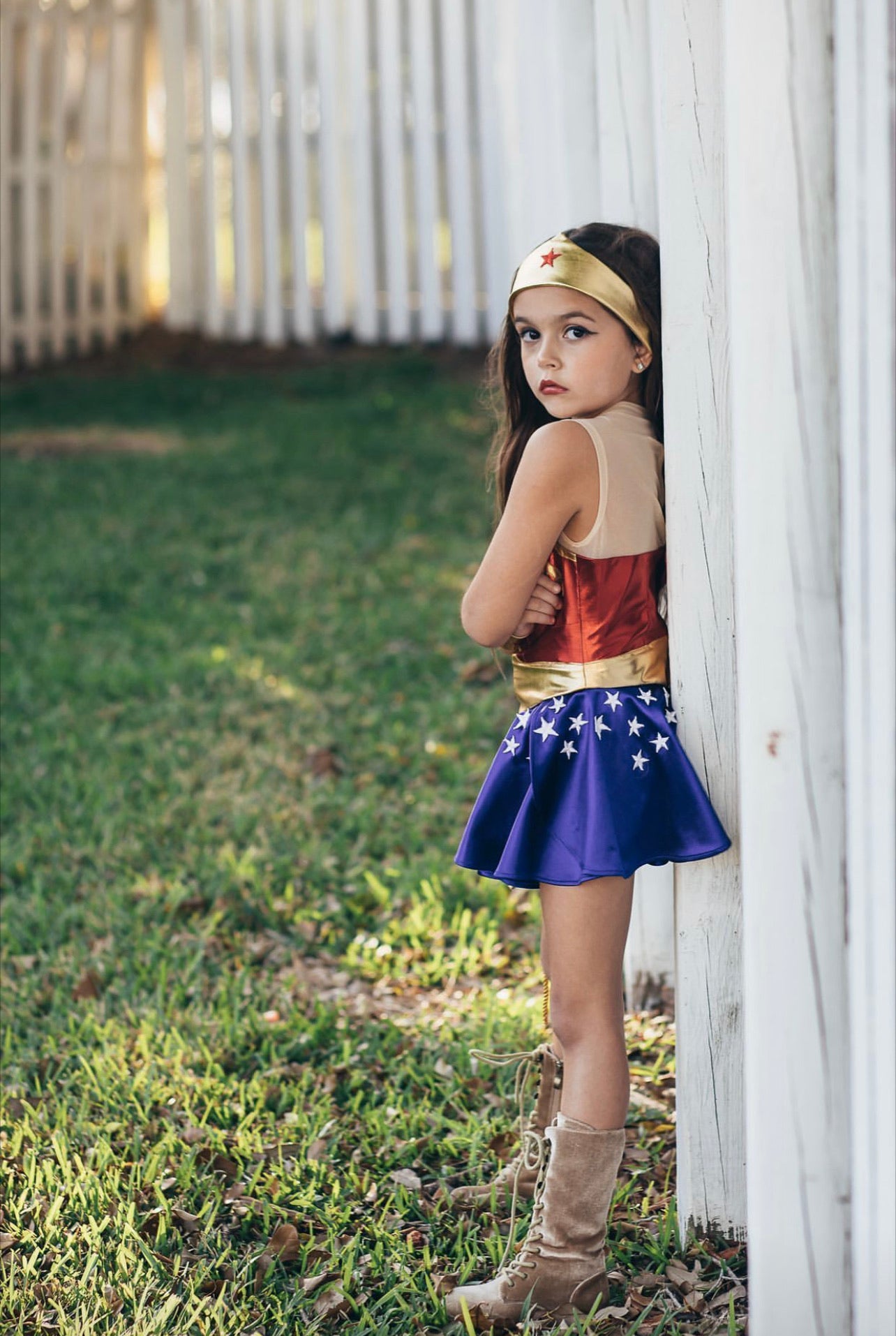 Vintage Wonder Woman costume for kids with red spandex bodice, starry skirt, crown, cuffs, and golden Lasso of Truth – perfect for birthdays, Halloween, and dress-up play.

