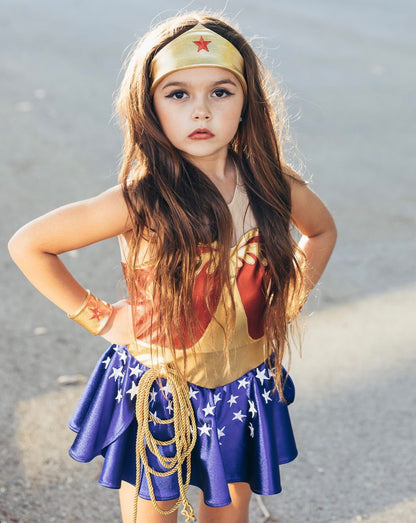 Vintage Wonder Woman costume for kids with red spandex bodice, starry skirt, crown, cuffs, and golden Lasso of Truth – perfect for birthdays, Halloween, and dress-up play.

